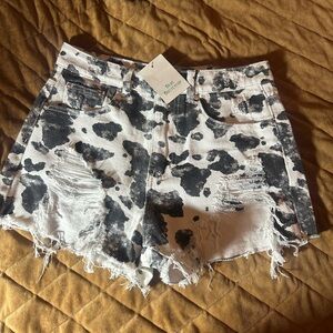 Distressed Cowprint shorts